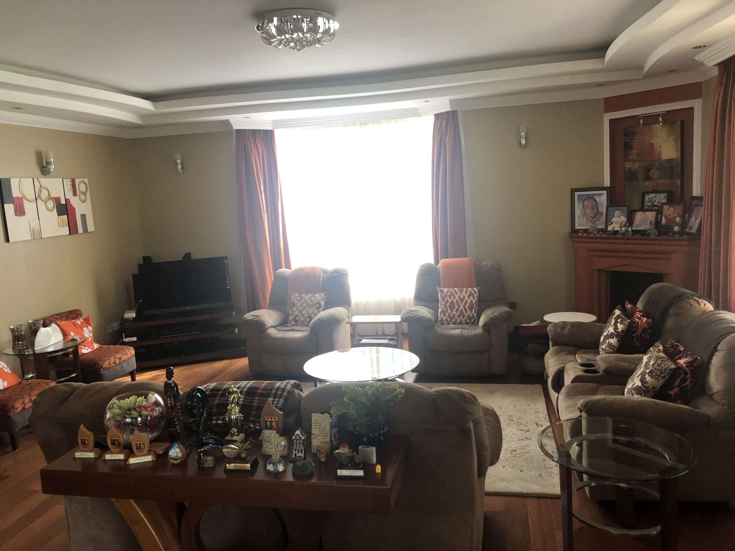A well-built double storey house with 5 bedrooms, all ensuite set on 0.5 of an Acre of flat land