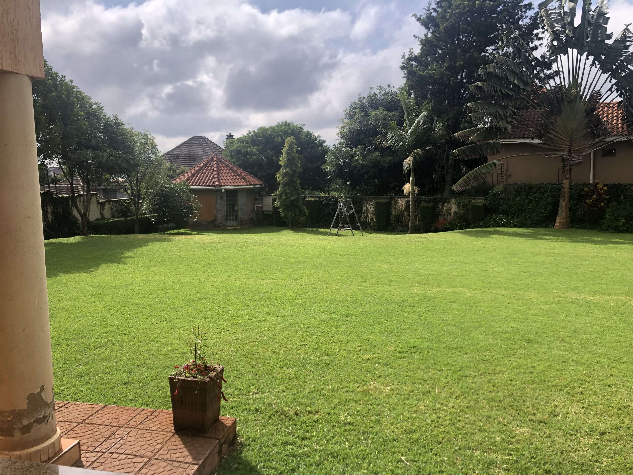 A well-built double storey house with 5 bedrooms, all ensuite set on 0.5 of an Acre of flat land