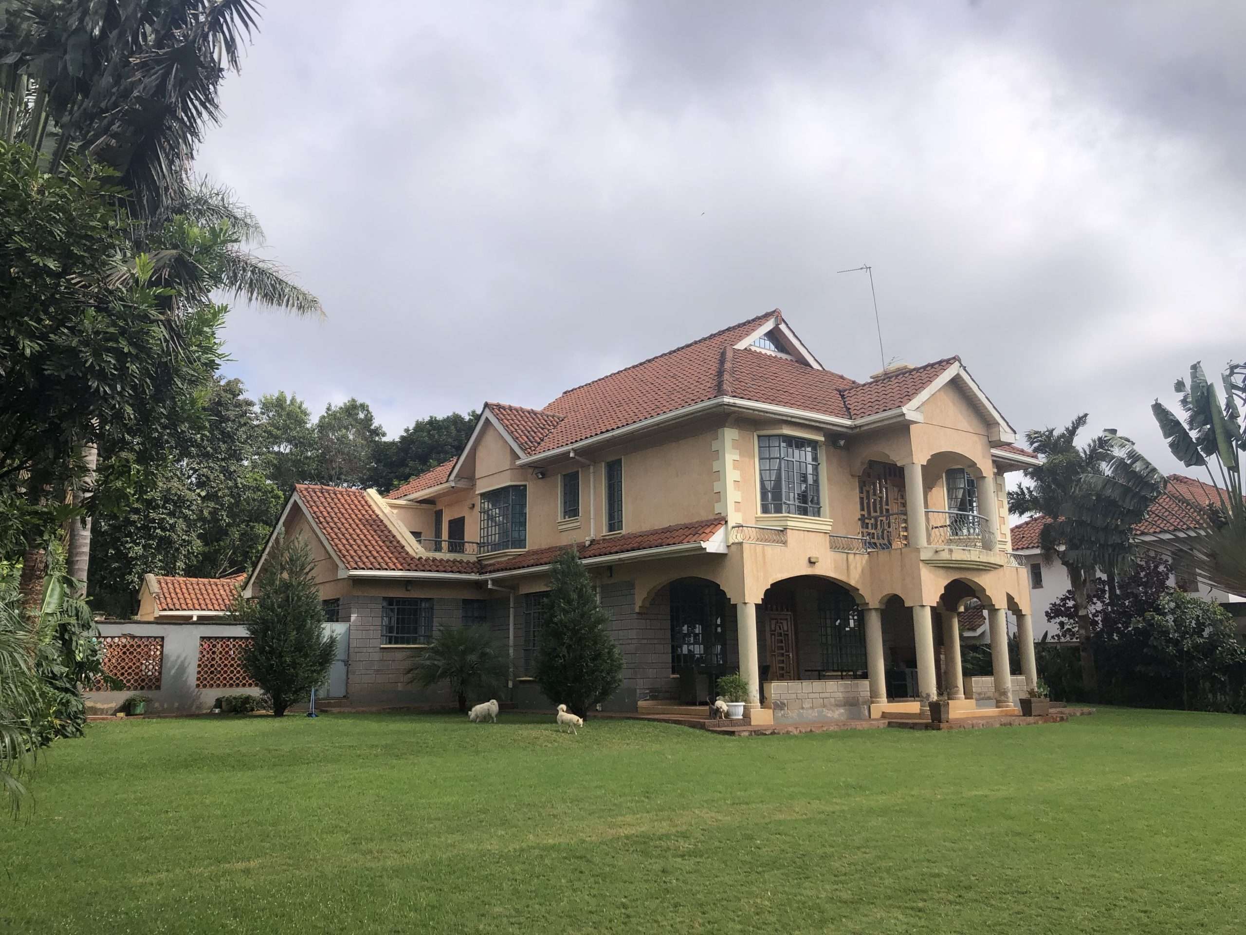 A well-built double storey house with 5 bedrooms, all ensuite set on 0.5 of an Acre of flat land