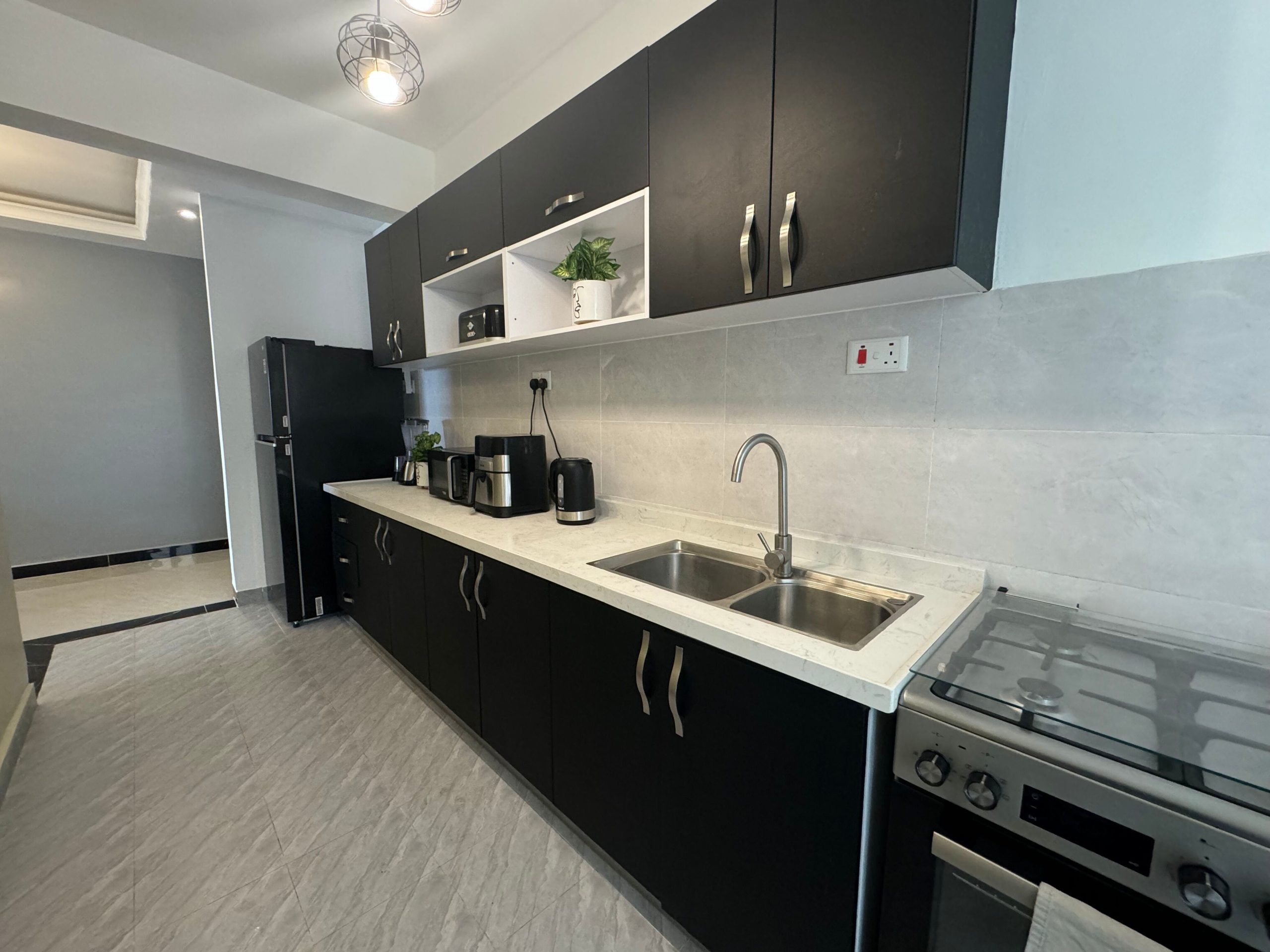 A delightfully finished and furnished to high standard is this 2-bedroom apartment in a low density compound in Kileleshwa