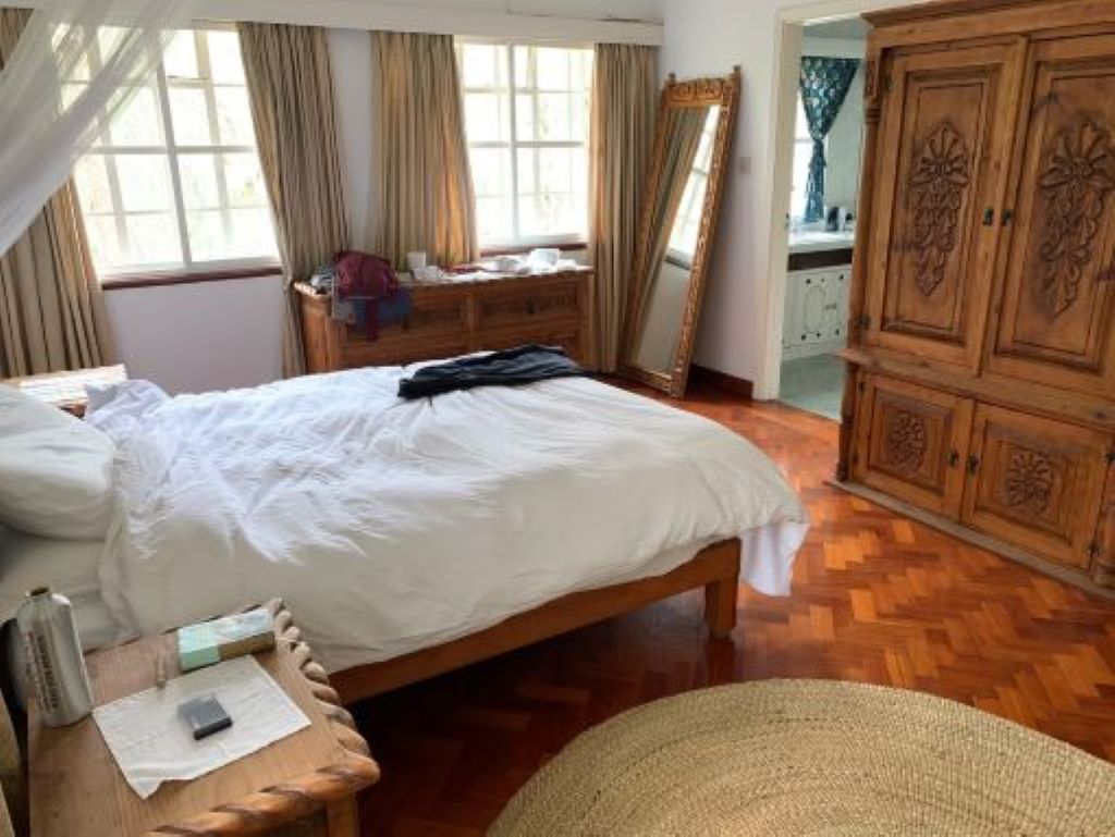 A charming rustic house featuring 4 spacious bedrooms, beautiful views of Karura forest
