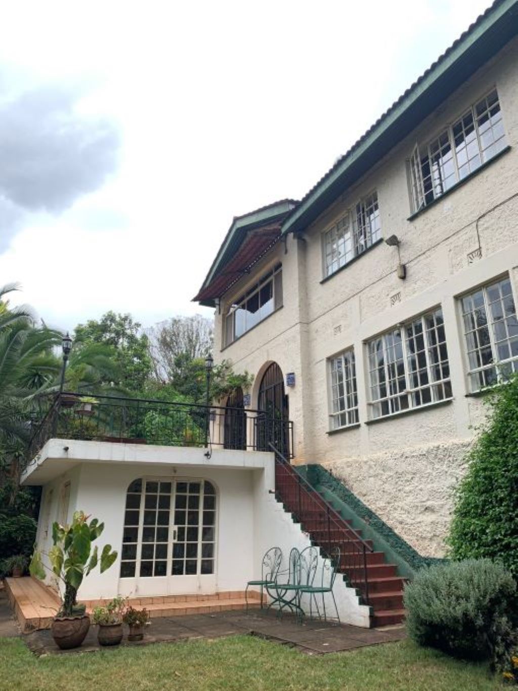A charming rustic house featuring 4 spacious bedrooms, beautiful views of Karura forest