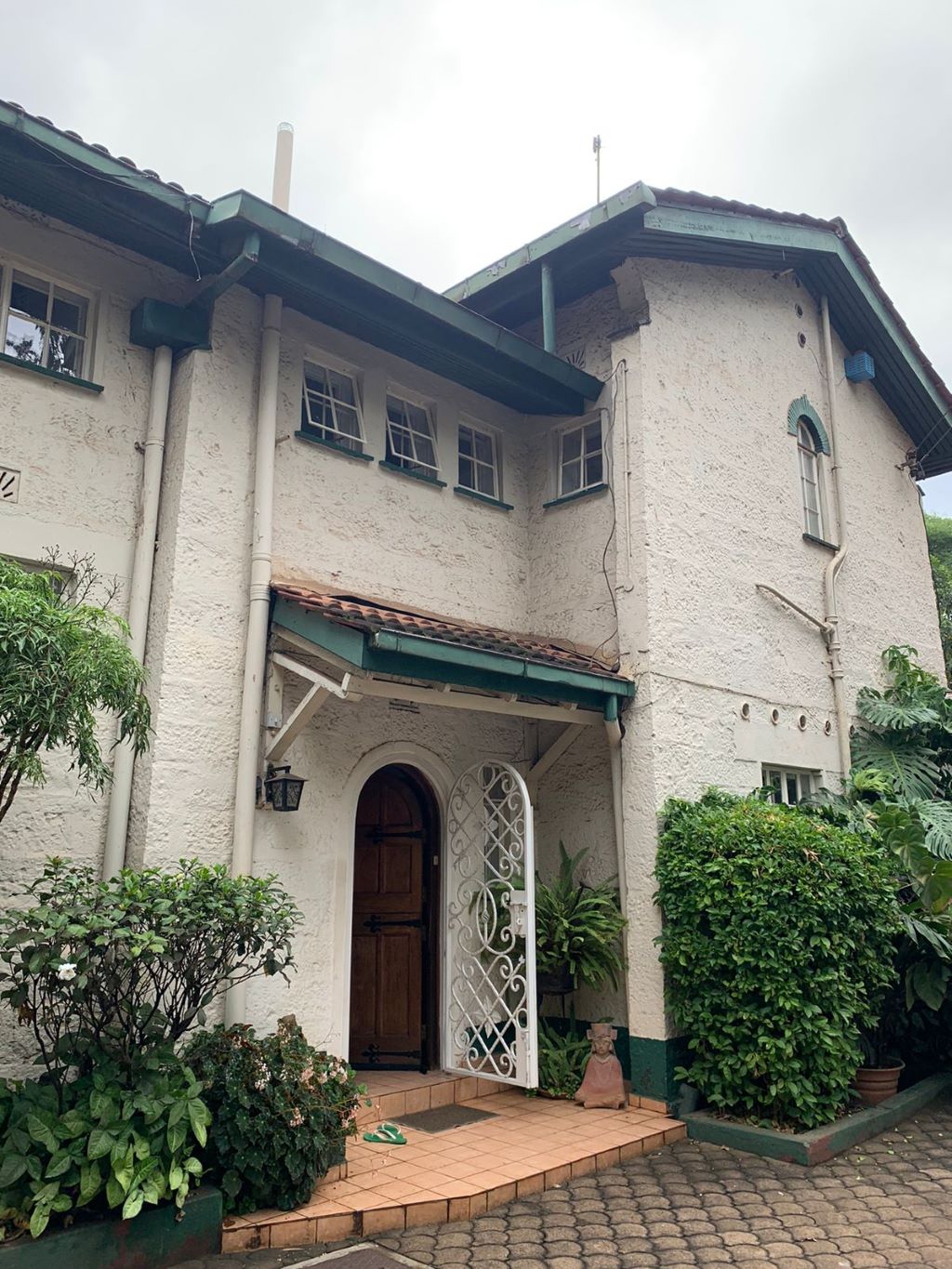 A charming rustic house featuring 4 spacious bedrooms, beautiful views of Karura forest