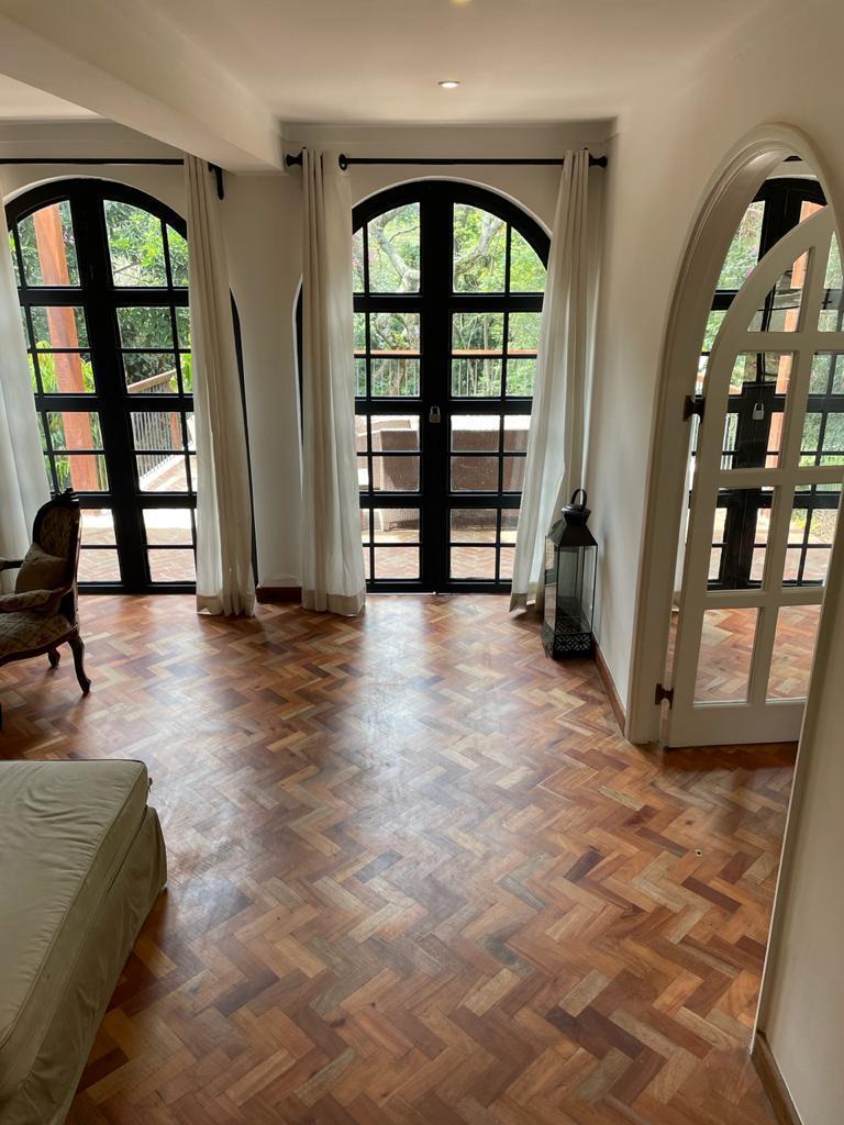 A charming 4-bedroom double storey house on 0.9 Acre of Mature garden for sale          