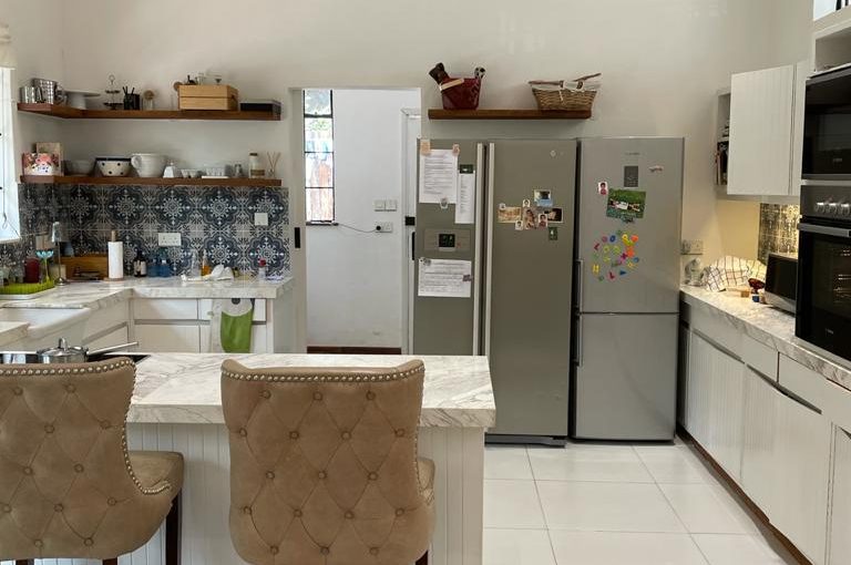 A charming 4-bedroom double storey house on 0.9 Acre of Mature garden for sale          