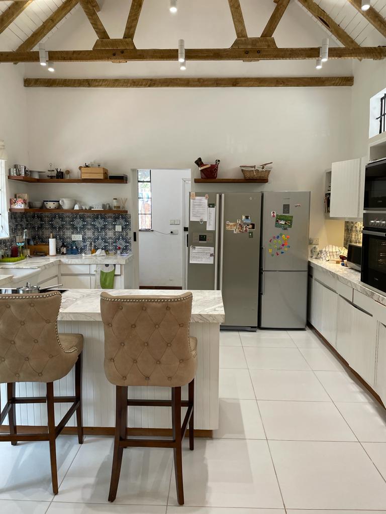 A charming 4-bedroom double storey house on 0.9 Acre of Mature garden for sale          