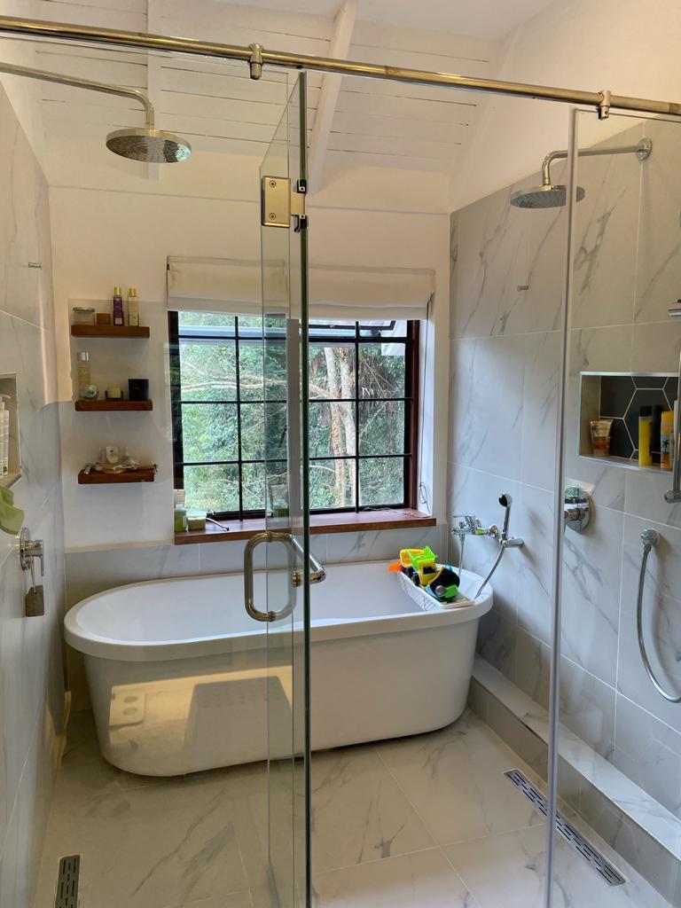 A charming 4-bedroom double storey house on 0.9 Acre of Mature garden for sale          