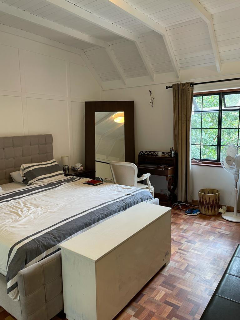 A charming 4-bedroom double storey house on 0.9 Acre of Mature garden for sale          