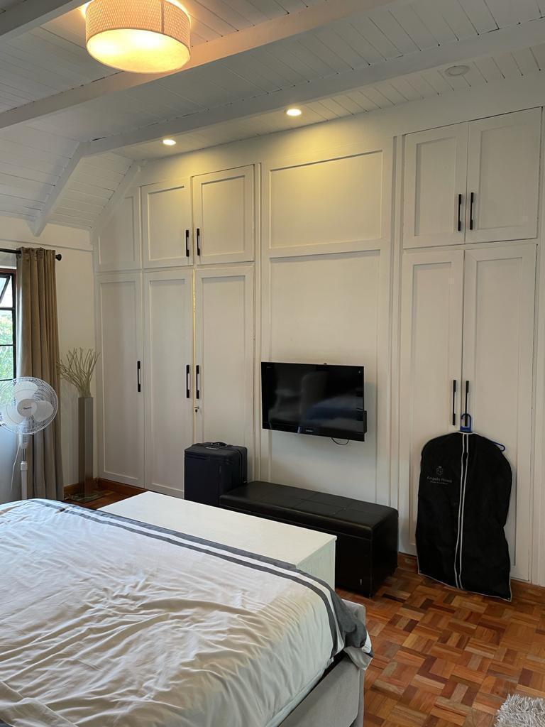 A charming 4-bedroom double storey house on 0.9 Acre of Mature garden for sale          
