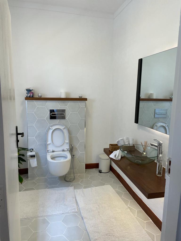 A charming 4-bedroom double storey house on 0.9 Acre of Mature garden for sale          