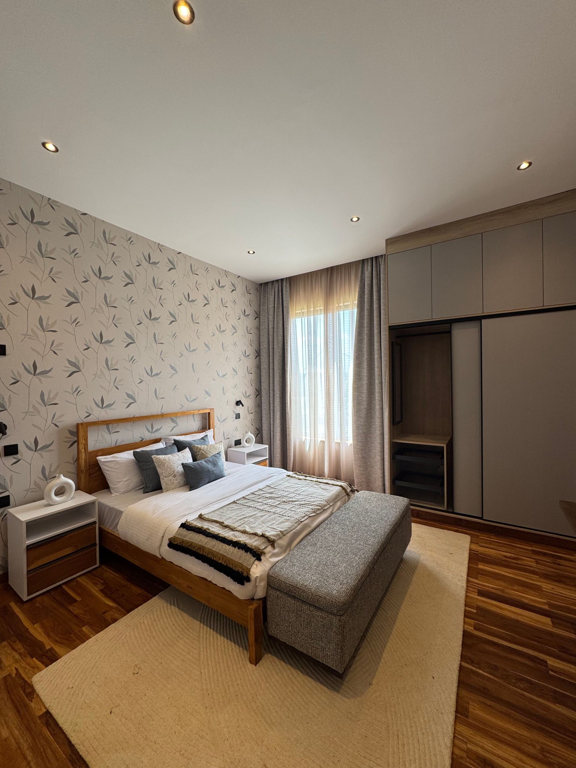 A newly built 4-bedroom villa offers contemporary living in a secure, gated compound