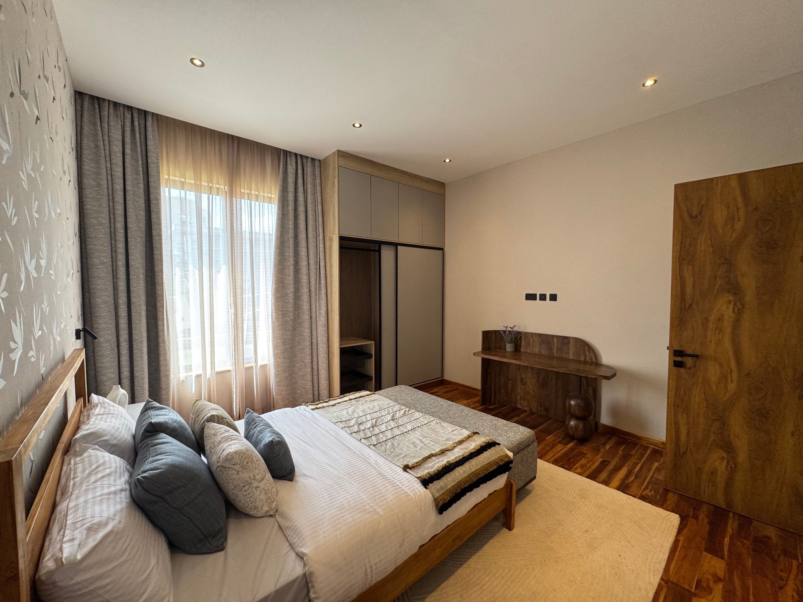 A newly built 4-bedroom villa offers contemporary living in a secure, gated compound