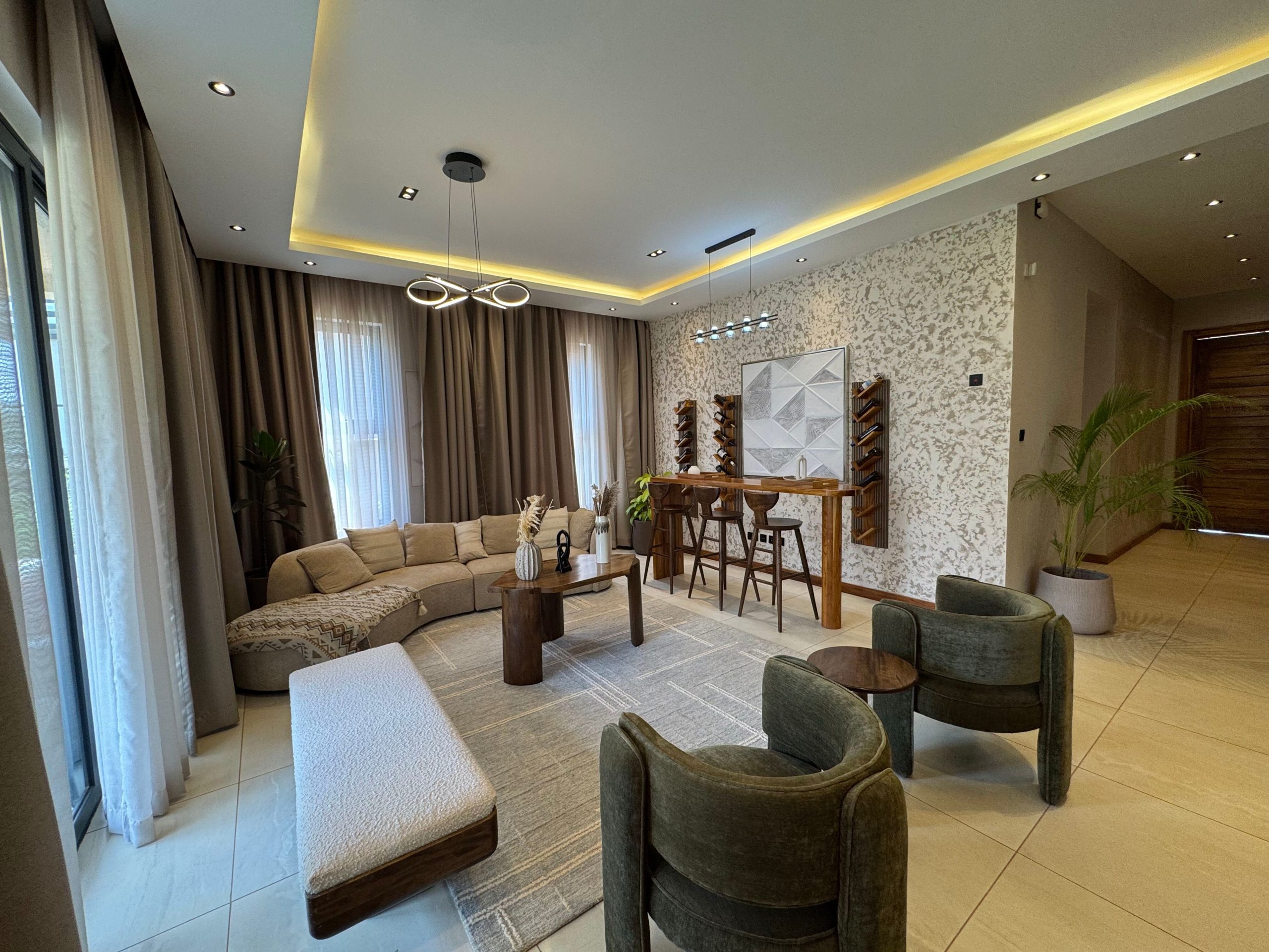 A newly built 4-bedroom villa offers contemporary living in a secure, gated compound