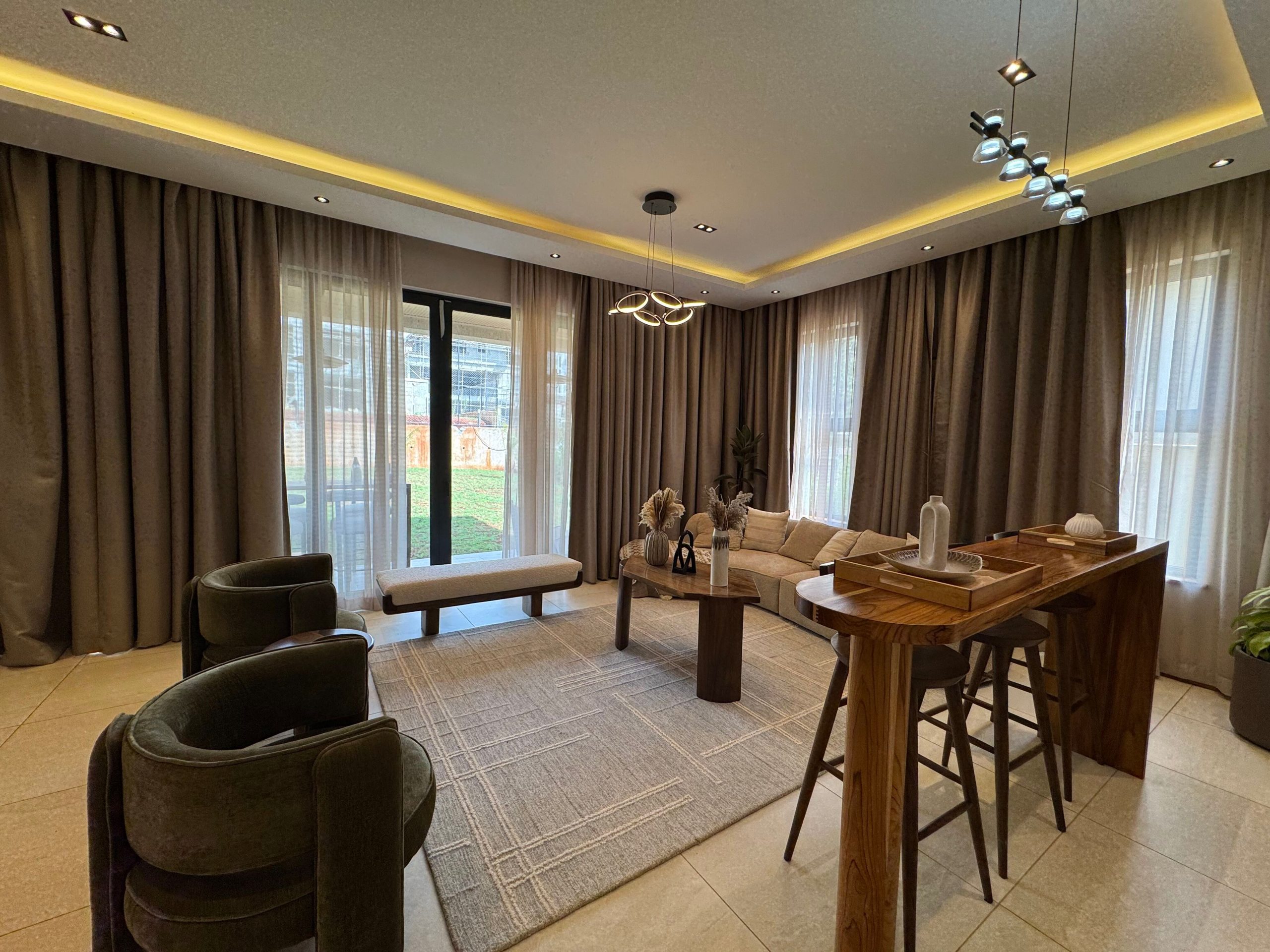 A newly built 4-bedroom villa offers contemporary living in a secure, gated compound
