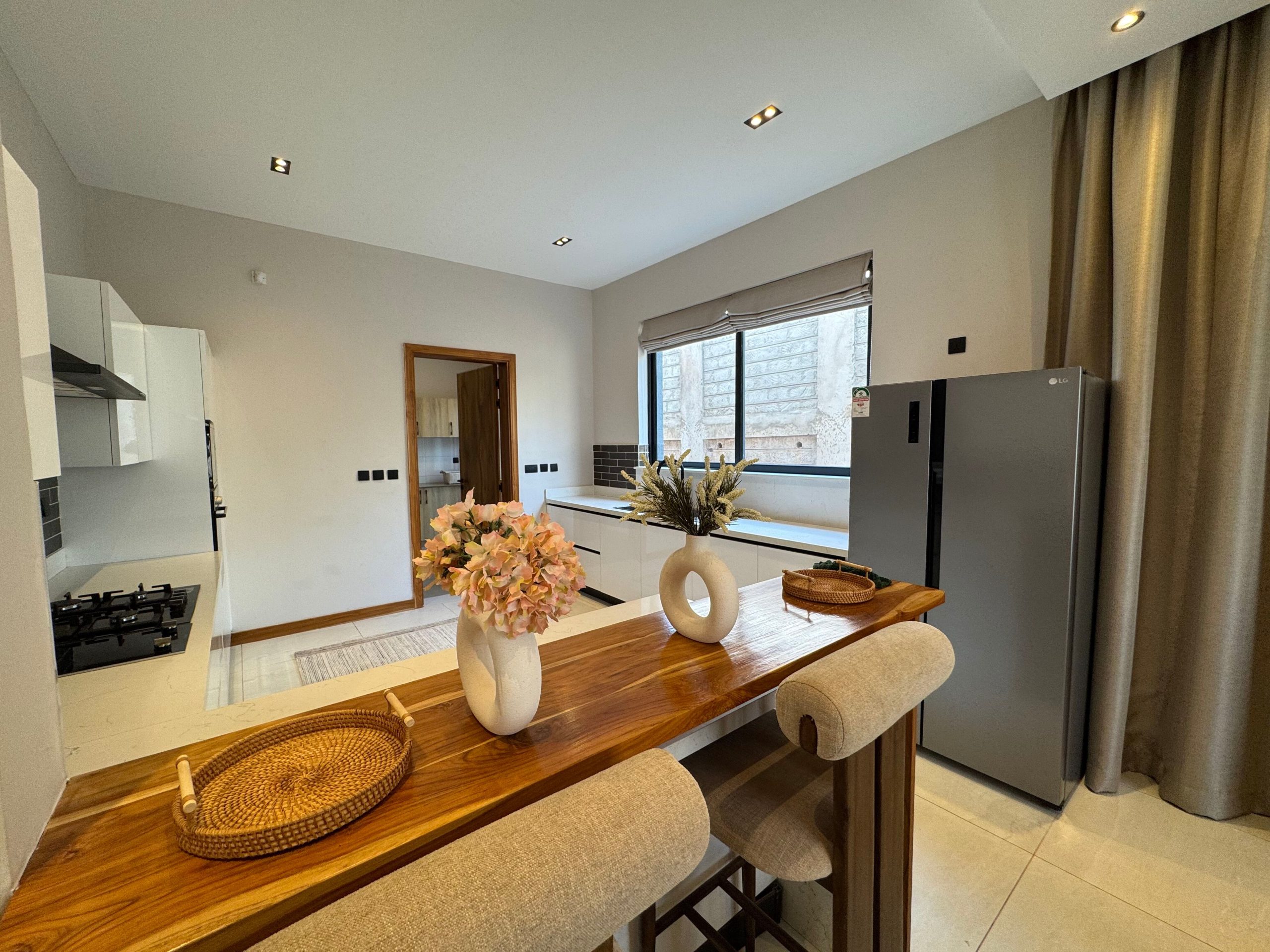 A newly built 4-bedroom villa offers contemporary living in a secure, gated compound