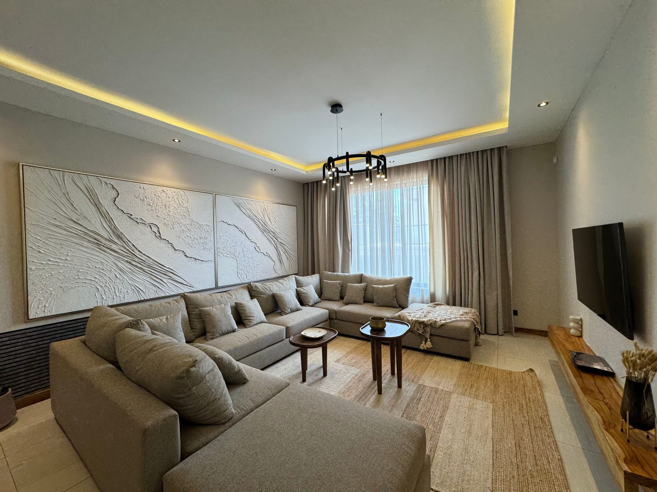 A newly built 4-bedroom villa offers contemporary living in a secure, gated compound
