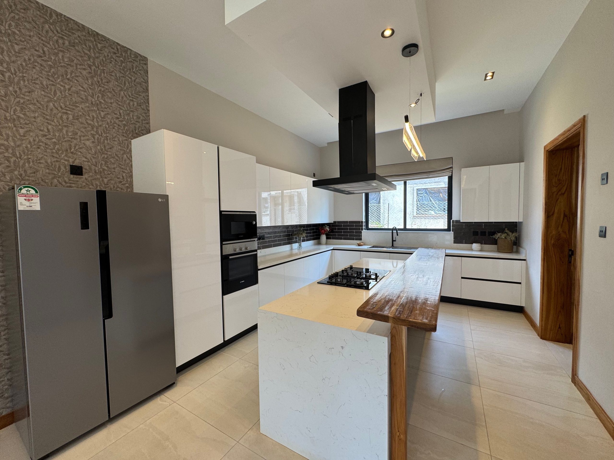 Discover modern living in this newly built 4- bedroom villa nestled in a serene, gated compound
