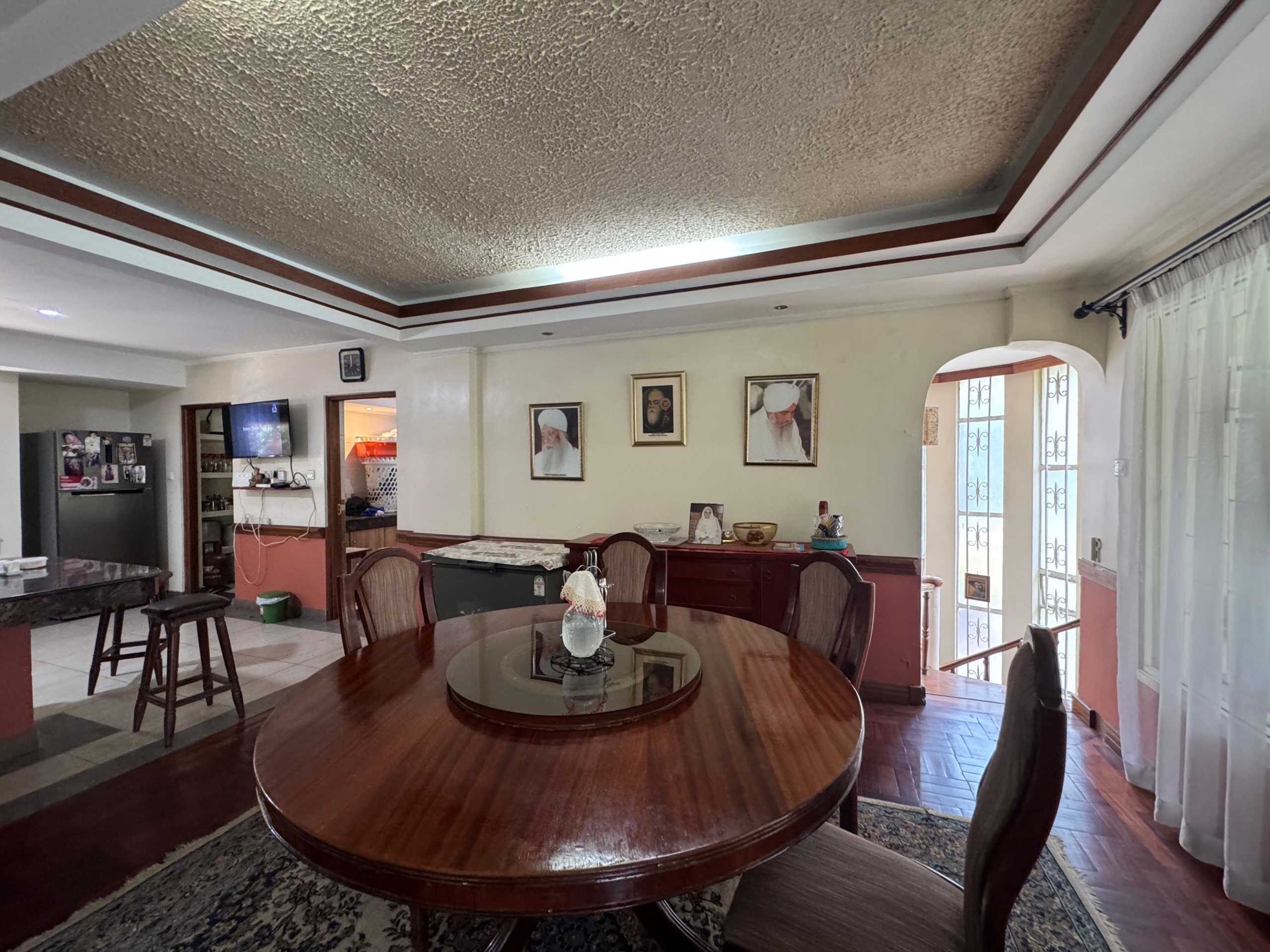 This charming house in Muthaiga exudes character and sits on an expansive, mature garden filled with lush greenery.