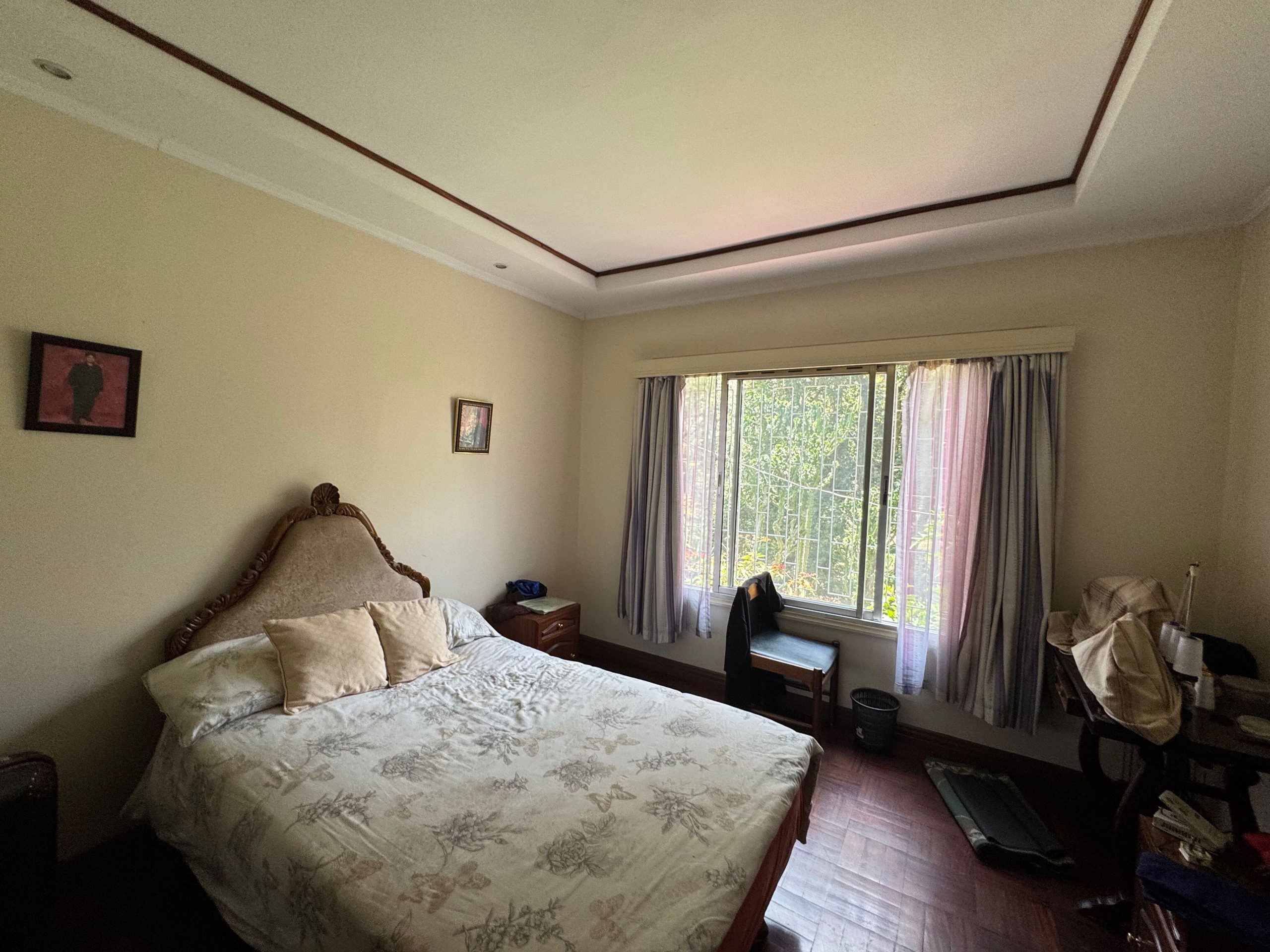 This charming house in Muthaiga exudes character and sits on an expansive, mature garden filled with lush greenery.