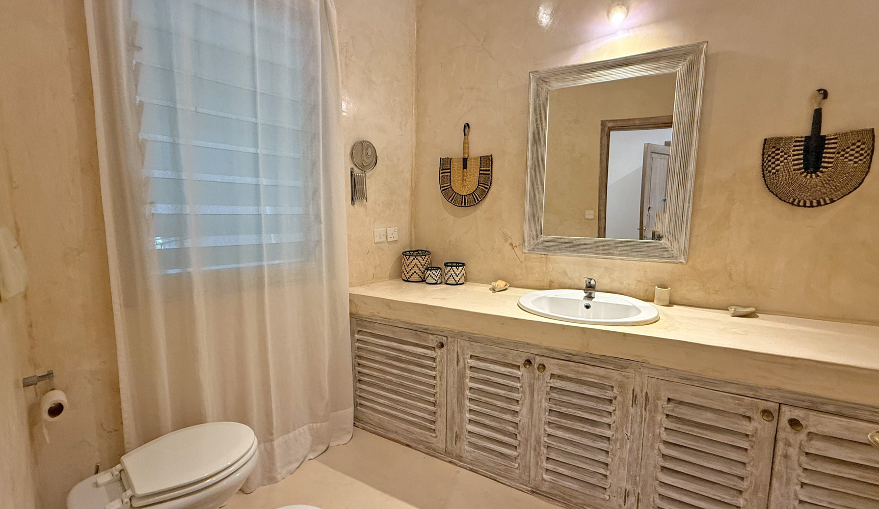 TWO SEPARATE 2-BEDROOM GROUND FLOOR APARTMENT IN AMANI RESORT
